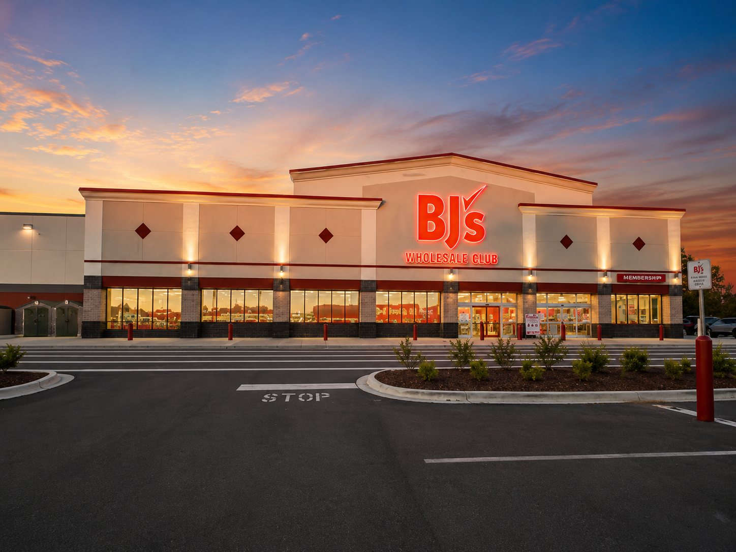 Completed BJ's Wholesale Club facility exterior at sunset, 370 Trinity Springs Lane, Selma NC 27576